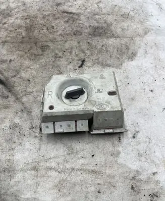 Tail light bulb cover holder