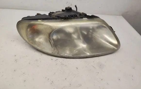Chrysler Voyager Headlight/headlamp 04857702AB