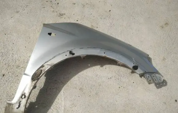Suzuki SX4 Fender pilkas