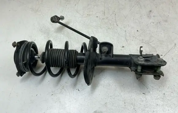 Nissan Leaf I (ZE0) Front shock absorber with coil spring 543033NF1A 43033NR1A E43033NF1A