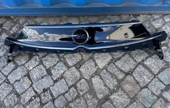 Opel Crossland X Front bumper upper radiator grill 39172214