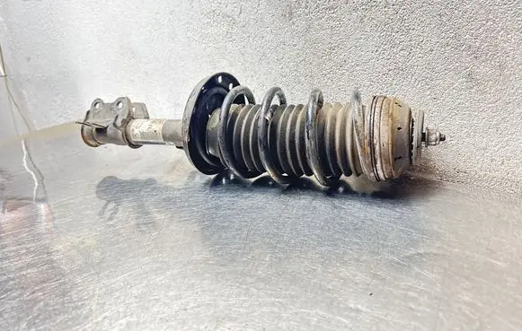 Opel Corsa D Front shock absorber/damper 13399044 22275350 0909120032
