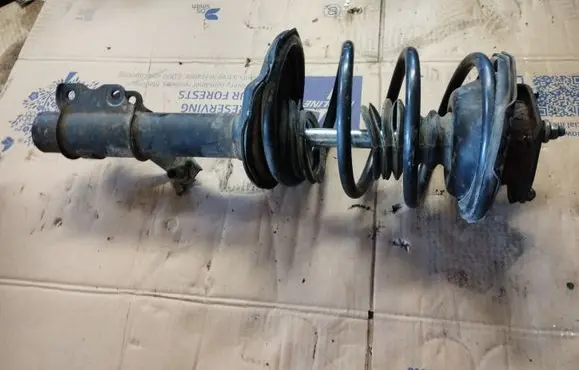 Nissan Serena Front shock absorber with coil spring
