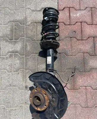 Front wheel hub spindle knuckle