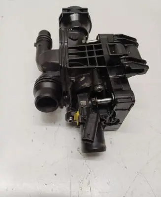 Thermostat/thermostat housing