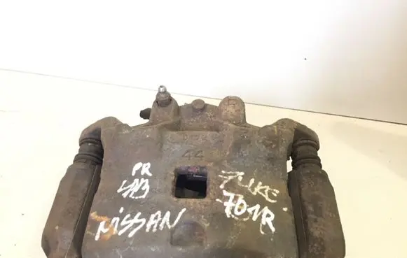 Nissan Juke I F15 Front brake caliper