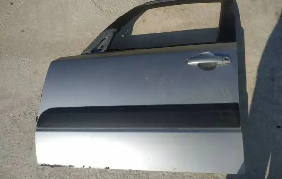 Suzuki SX4 Front door pilkos