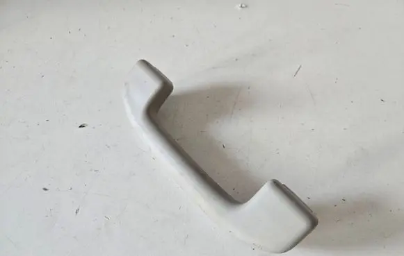 Front interior roof grab handle