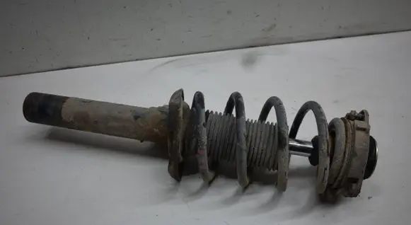 Seat Leon (1P) Front shock absorber with coil spring 1T0413031FF
