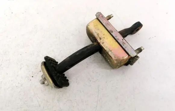Mazda 626 Rear door check strap stopper