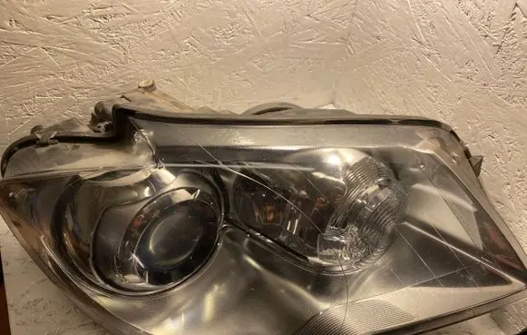 Volkswagen Touran I Headlight/headlamp 1305236227 1K0941329 1307329120