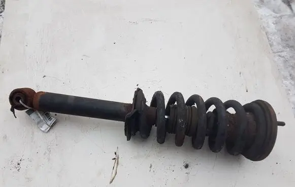 Mitsubishi Pajero Front shock absorber with coil spring MR55492