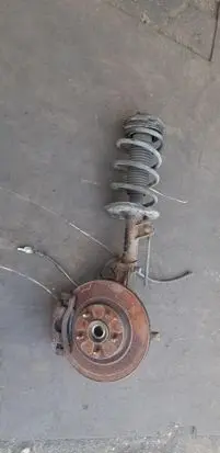 Nissan Qashqai Front shock absorber with coil spring 54303BR00B