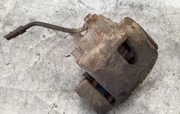 Chrysler Grand Voyager IV Front brake caliper