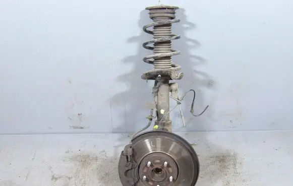 Front shock absorber with coil spring