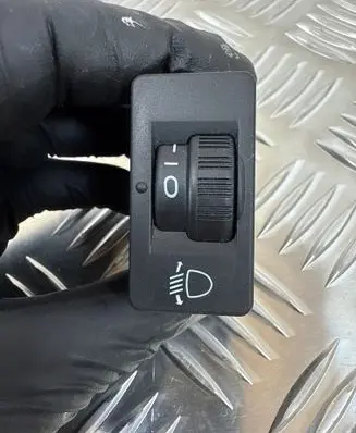 Headlight level height control switch