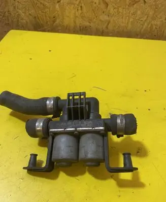 Coolant heater control valve