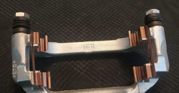 Opel Meriva A Brake caliper pad carrier rear 