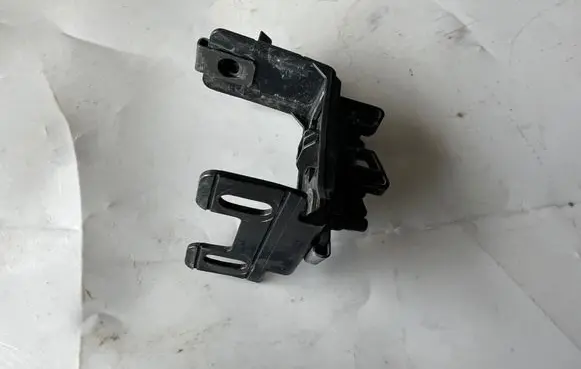 Ford Edge II Headlight/headlamp mounting bracket FT4B13A004A