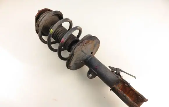 Toyota Corolla E120 E130 Front shock absorber with coil spring 