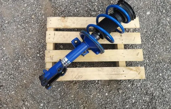 Ford Mustang V Front shock absorber with coil spring 120809B