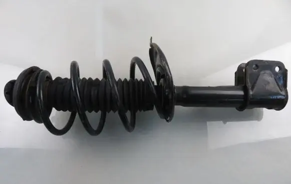 Citroen Berlingo Front shock absorber with coil spring