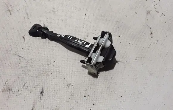 Front door check strap stopper