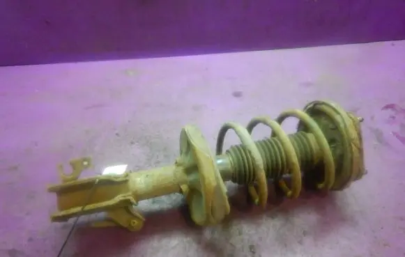 Mazda 323 Front shock absorber with coil spring