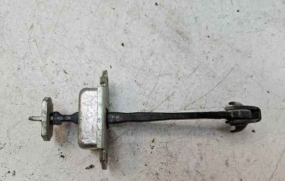 Nissan Note (E11) Rear door check strap stopper