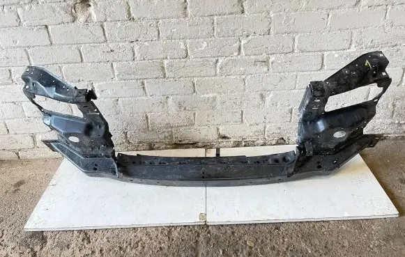 Radiator support slam panel bracket