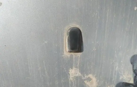 Windshield washer spray nozzle