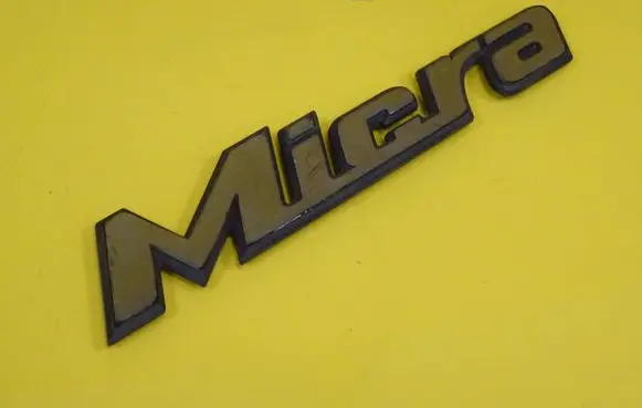 Nissan Micra Manufacturer badge logo/emblem 908906F610