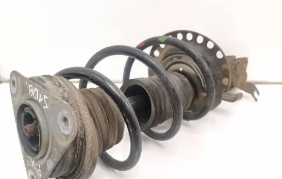 Front shock absorber with coil spring