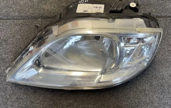Dacia Logan I Headlight/headlamp 8200744753 00115834