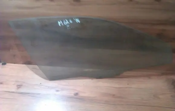 Mazda 626 Front door window glass four-door
