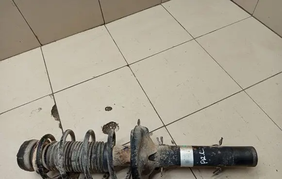 Volkswagen Golf IV Front shock absorber with coil spring 
