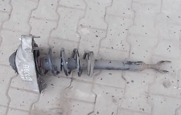 Front shock absorber with coil spring