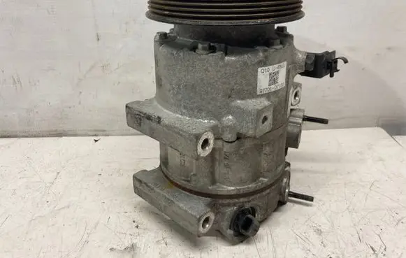 KIA Sportage Air conditioning (A/C) compressor (pump) 97701D7100