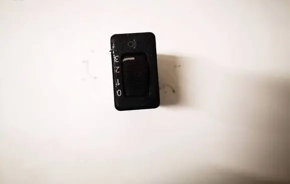 Headlight level height control switch