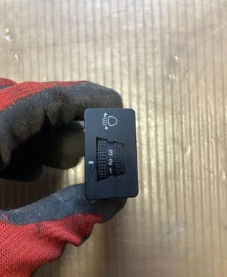 Headlight level height control switch