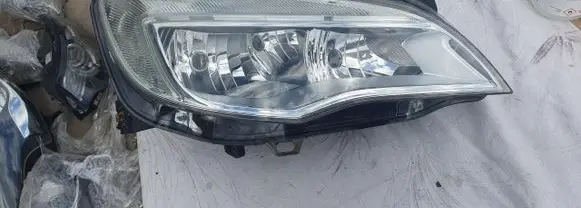 Opel Astra J Headlight/headlamp 13253657