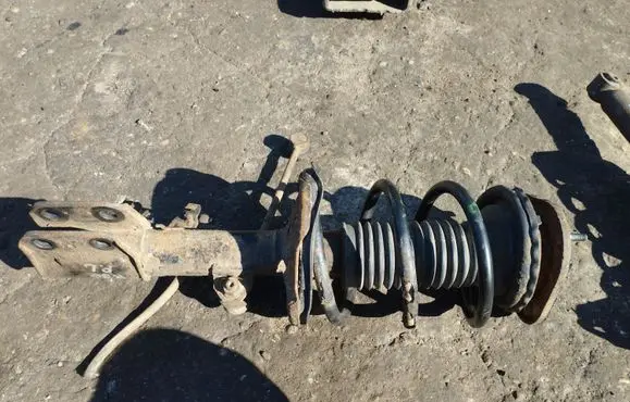 Toyota Corolla Verso AR10 Front shock absorber with coil spring