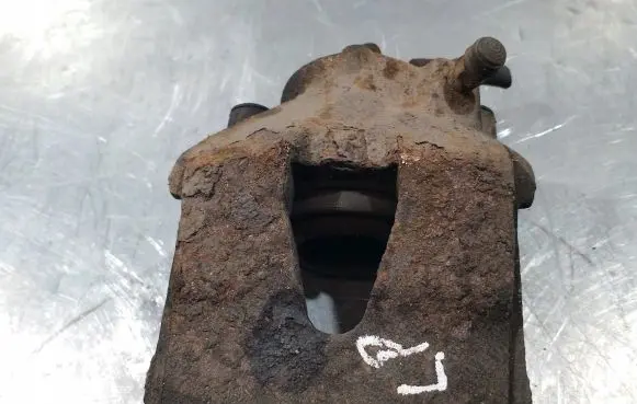 Volkswagen Golf V Front brake caliper