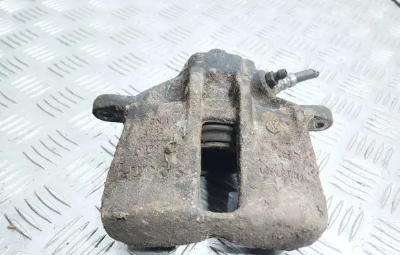 Volkswagen Golf III Front brake caliper