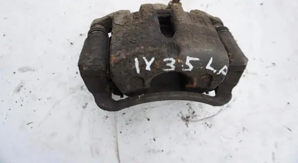 Hyundai Lantra I Front brake caliper