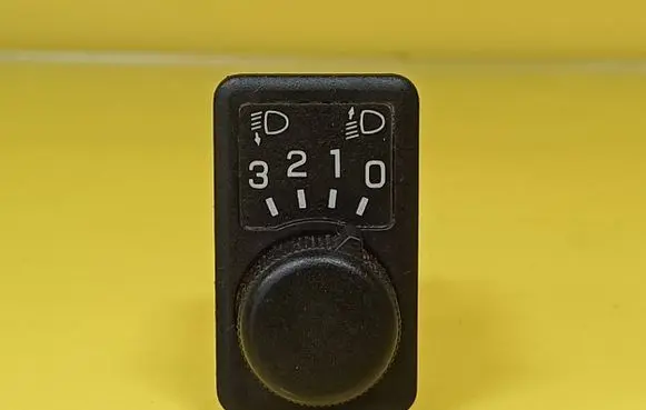 Nissan Primera Headlight level height control switch 36934A