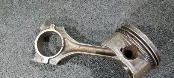 Piston with connecting rod