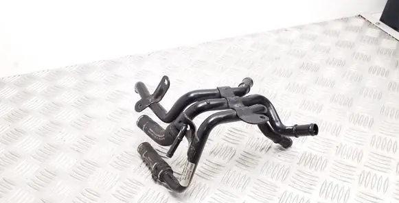 Volkswagen Golf VII Engine coolant pipe/hose 04L121064AD 04L121101