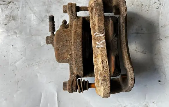 Opel Frontera B Front brake caliper