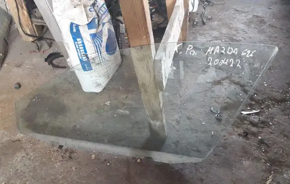 Mazda 626 Front door window glass four-door